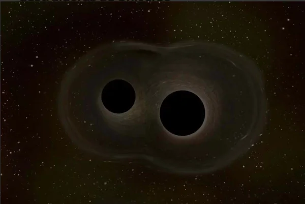 Fusão de buracos negros pode criar bolhas destruidoras de Universo
