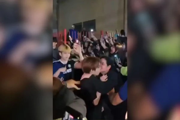 Imagem mostra o momento em que cantor de K-pop é alvo de assédio. Metrópoles