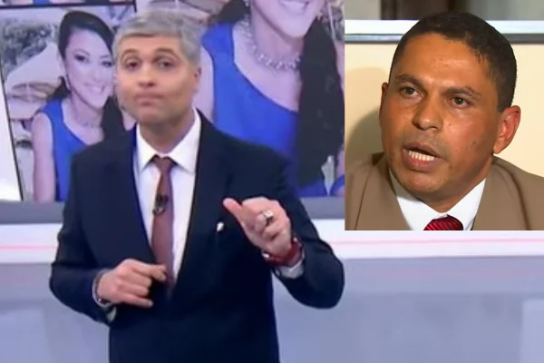 Imagem colorida de homem com terno e gravata em estúdio de televisão, com imagem de mulher asiática ao fundo, em monitores - Metrópoles