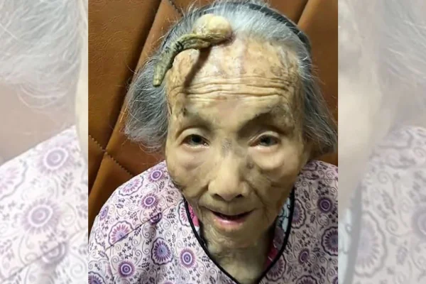 Foto colorida de uma mulher com chife - Metrópoles