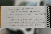 Caderno com anotações de falso pai de santo Caderno com anotações de falso pai de santo
