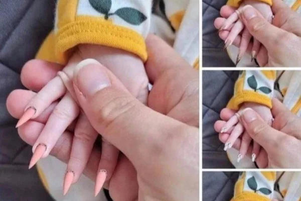 Mãe é detonada na web ao postar foto de bebê com unhas postiças