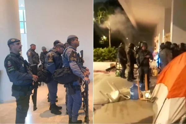 Imagem colorida mostra PM em desocupação da reitoria da USP. Metrópoles
