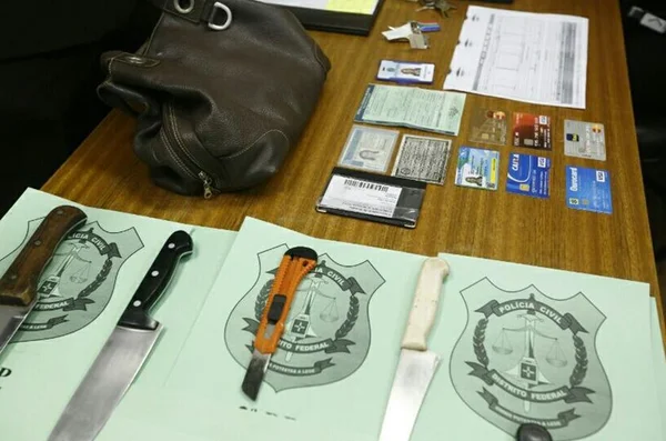 Assassinos de servidora queriam trocar objetos roubados por drogas