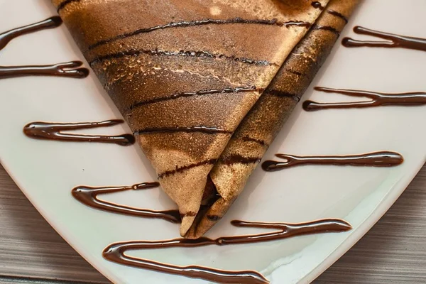Crepe de chocolate e doce de leite - Metrópoles