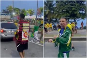 Apoiador de Flávio Bolsonaro puxando homem acorrentado com menção ao PT Apoiador de Flávio Bolsonaro puxando homem acorrentado com menção ao PT