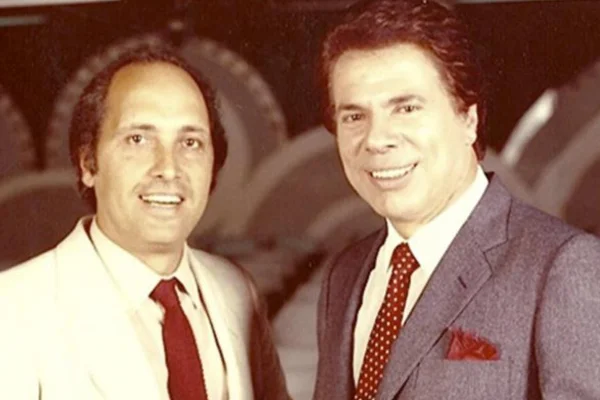 Imagem colorida de Luciano Callegari com Silvio Santos