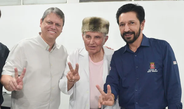 Tarcísio de Freitas, padre Rosalvino e Ricardo Nunes - Metrópoles
