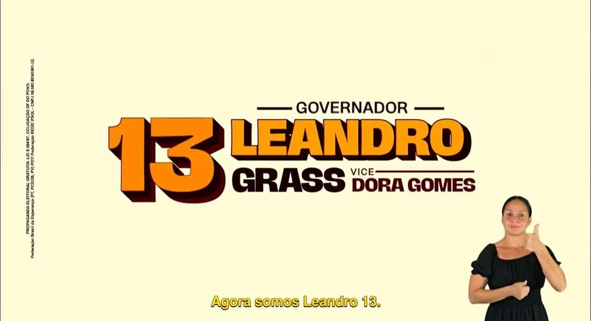 No 2º turno, Leandro Grass está utilizando tons de laranja ao invés do vermelho do PT No 2º turno, Leandro Grass está utilizando tons de laranja ao invés do vermelho do PT