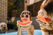 Eating watermelon is one of the ways to stay hydrated by eating fruit.