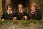 Os atores Daniel Radcliffe, Emma Watson e Rupert Grant no set do filme Harry Potter e o Cálice de Fogo