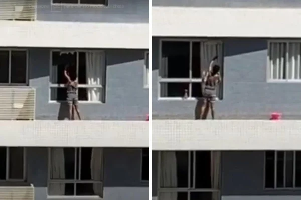 Mulher se arrisca para limpar janela em Águas Claras