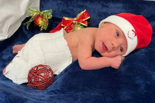 Bebê em ensaio fotográfico de Natal no HUB