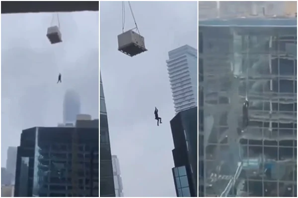 Frames de vídeo mostra momento em que operário sofre acidente e fica pendurada a 100 metros de altura numa carga içada por fio de aço no Canadá - Metrópoles