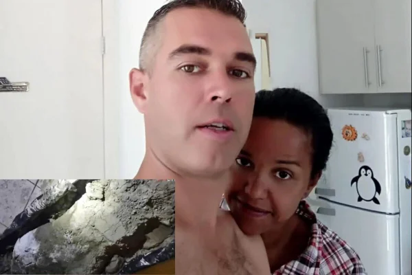 Foto colorida de homem branco, sem camisa, cujo ombro esquerdo é usada como apoio por mulher parda, encostando o queixo - Metrópoles