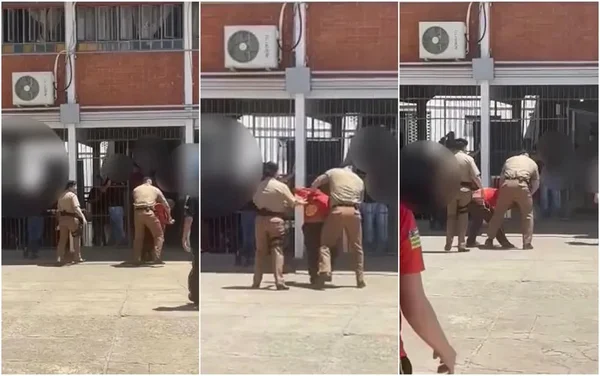 imagem colorida aluno empurrado colegio militar