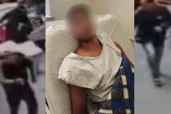 Homem pardo, com a face embaçada, sentado em maca hospitalar, com camisola de paciente - Metrópoles