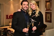 Val Marchiori e o marido,  o advogado Amilton Augusto, brindam durante evento