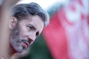 Leandro Grassa faz campanha em assembleia dos rodoviários no Conic, mas vai embora antes da reunião do sindicato.
