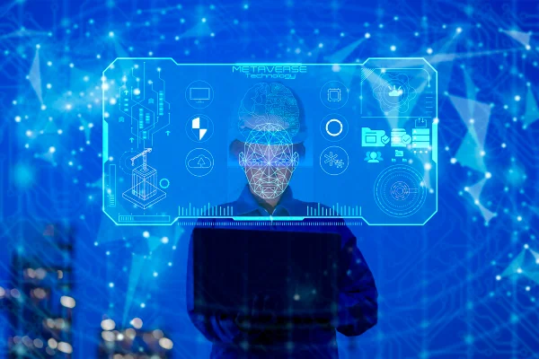 Foto colorida. Homem com o rosto próximo a um celular em uma realidade virtual