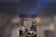 Projeções em serra de BH têm ataques a Flávio e pedidos de voto para Lula
