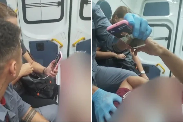 Imagem colorida mostra resgate de bombeiros com apoio de intérprete de Libras. Metrópoles