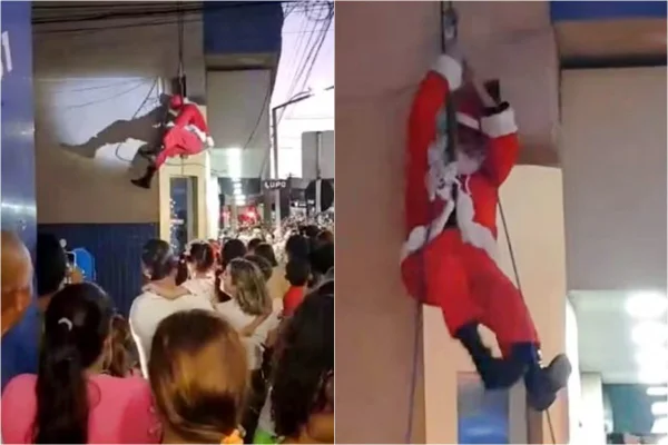 Foto colorida de papai Noel pendurado em Minas Gerais - Metrópoles