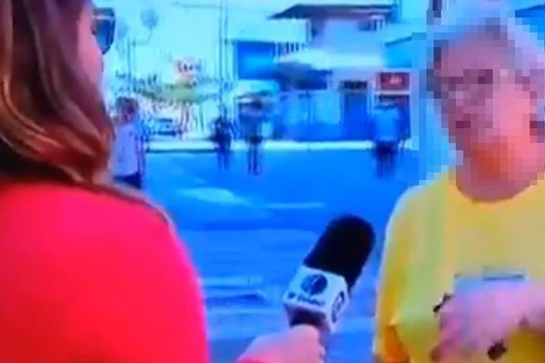 Idosa entrevistada pela Globo dá patada ao vivo