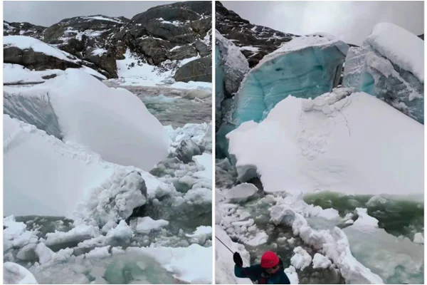 Foto colorida do momento em que geleira se desprende no Peru - Metrópoles