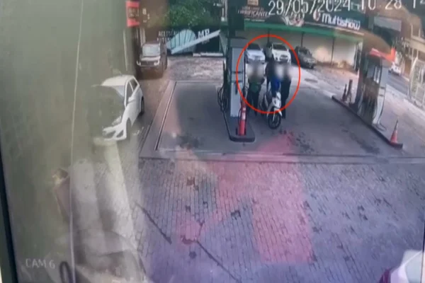 Imagens da câmera de segurança mostram ex-PM sendo baleado Metrópoles