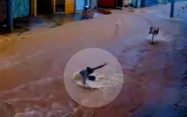 imagem colorida mulher arrastada pela enxurrada entorno do df