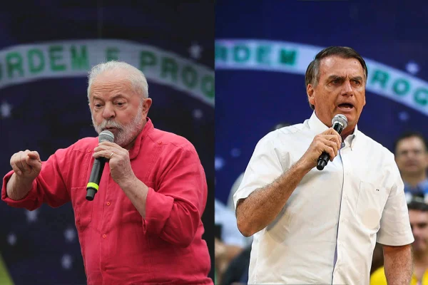 Os candidatos à presidência Lula e Bolsonaro (esquerda e direita, respectivamente) discursam frente a bandeia do Brasil, ambos com microfones em mãos em fotos justapostas - Metrópoles