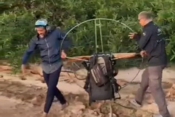 Bombeiro de folga resgata piloto que caiu de parapente em GO - Metrópoles