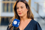 Grace Abdou é clicada nos bastidores de uma das suas reportagens
