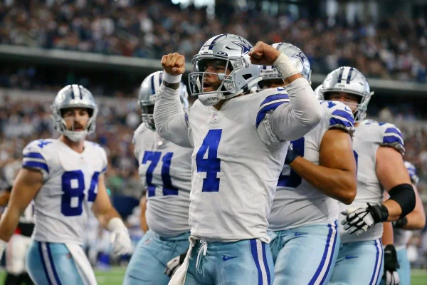 Jogadores do Cowboys comemoram Touchdown