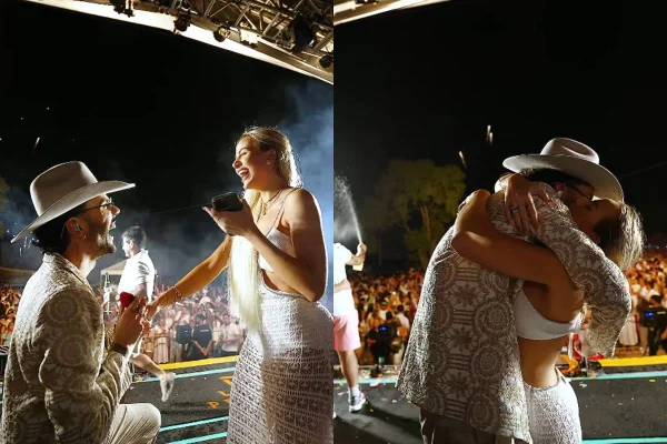 Foto colorida de Luan Pereira pedindo a namorada em casamento durante show - Metrópoles