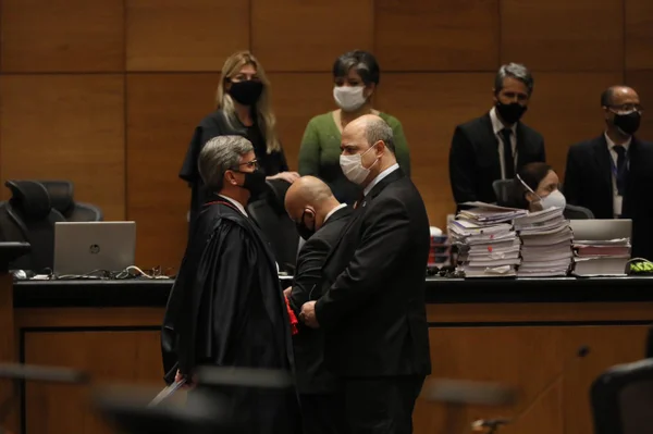 Henrique Carlos de Andrade Figueira e Wilson Witzel durante julgamento no Tribunal de Justiça do Rio