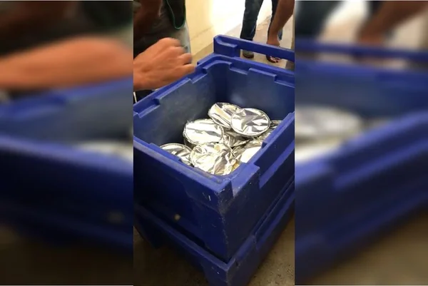 Funcionário é preso por levar drogas para detentos dentro de marmitas