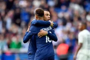 PARIS, FRANCE - FEBRUARY 19: Neymar Jr of Paris Saint-Germain is congratulated by teammate Kylian Mbappe after scoring during the Ligue 1 match between Paris Saint-Germain and Lille OSC at Parc des Princes on February 19, 2023 in Paris, France. 