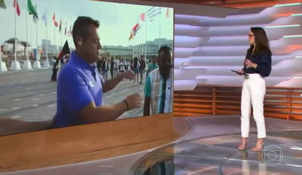 Imagens do Bom Dia Brasil, da Rede Globo. Erick Faria empurra torcedor ao vivo - Metrópoles
