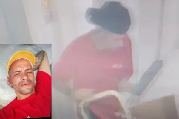 Imagem de frame de câmera com homem carregando carrinho com caixa de papelão - Metrópoles